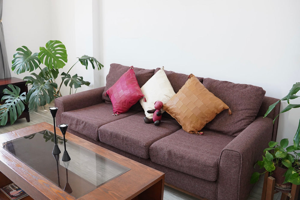 A luxuriously roomy leather cushion cover promising the ultimate relaxation experience